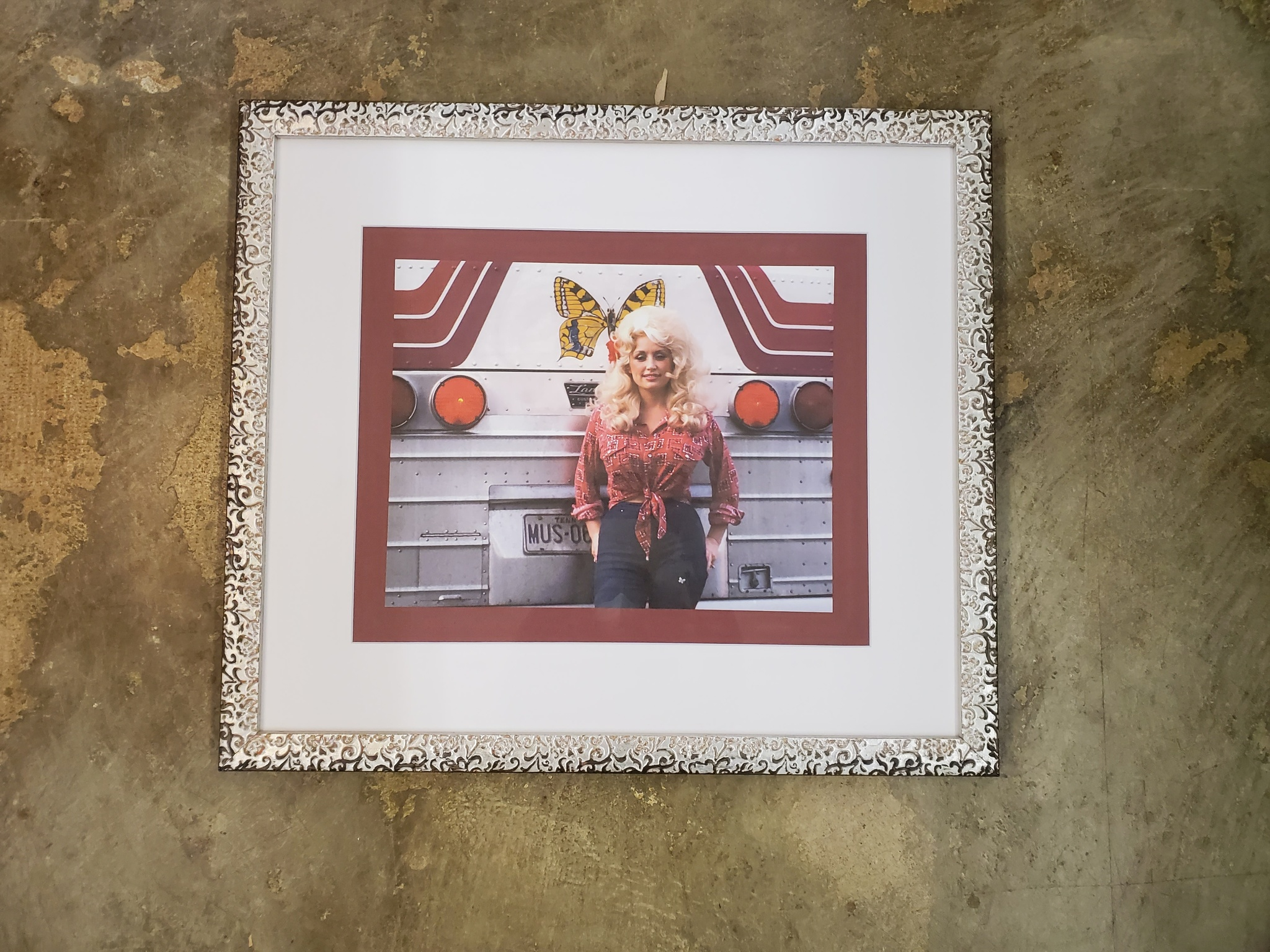 Framed concert poster with UV-protective glazing