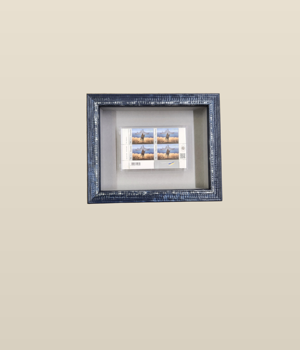 Framed sports memorabilia and jersey shadow box